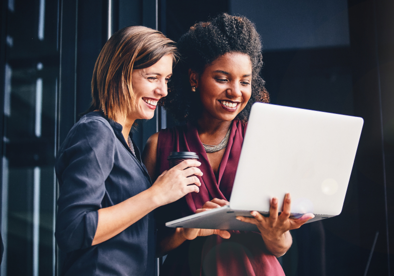 women checking computer