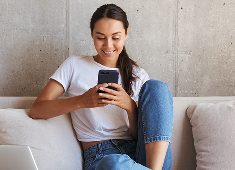Girl on couch with phone
